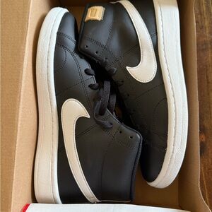 Women’s Nike Black and White High-Top Sneakers